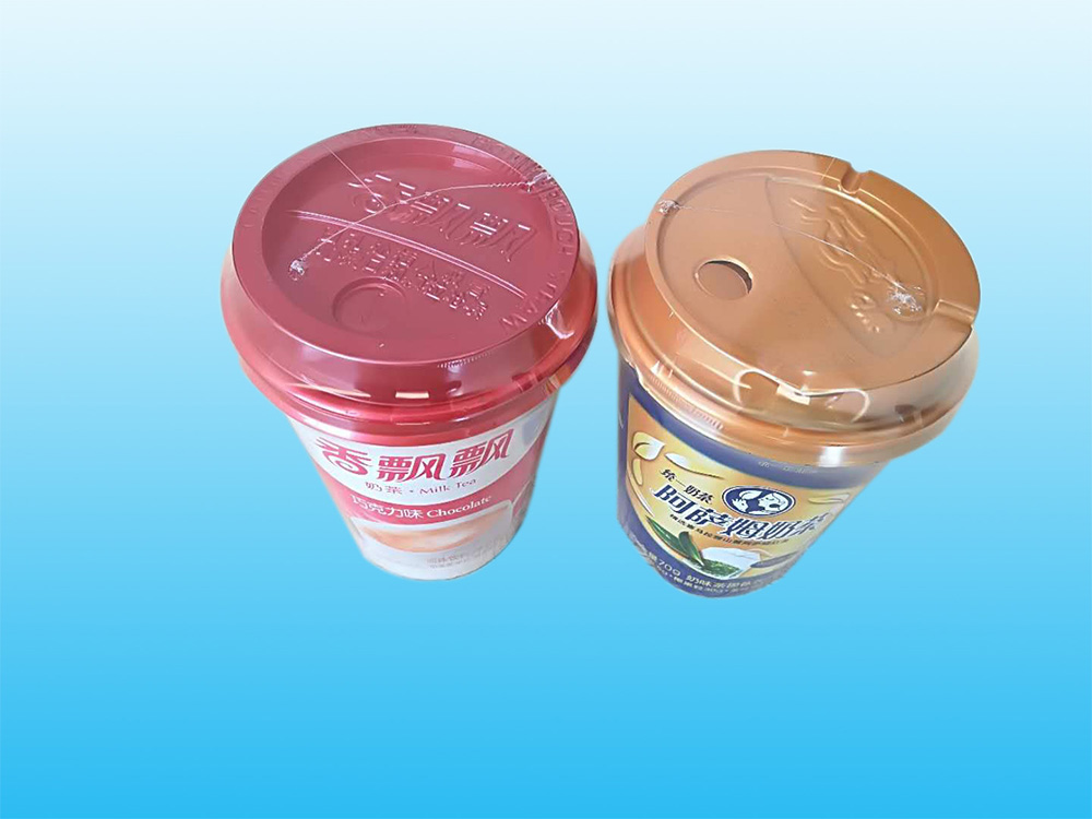 Trial run - POF film heat shrinking flow packaging machine for wrapping milk tea cup